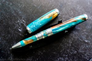 The Saturn Roller Ball in Turquoise Feathers